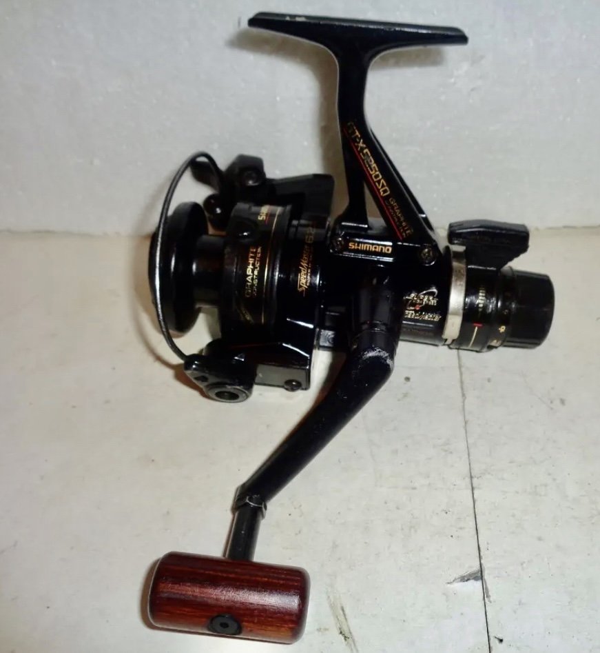 Fishing SHIMANO FX200 Graphite Spinning Reel with Rear Drag