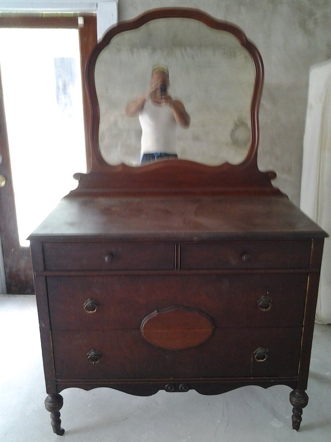 I Have An Antique Dresser That Has Wooden Wheels, A Mirror ...